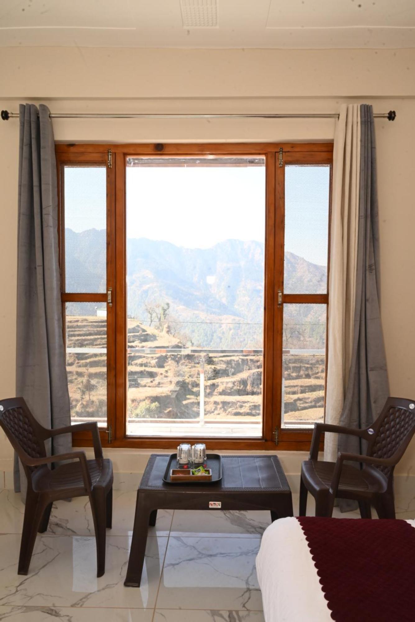 קנאטל Himalayan Hill Top Resort מראה חיצוני תמונה